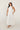 Vestido Victoria blanco de encaje con cuello halter