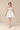 Vestido Renata corset con falda de vuelo y lazo frontal.