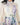 Vestido Amara corto floral con botones decorativos
