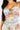 Vestido Azul largo con escote cruzado y estampado floral.