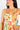 Vestido Coralia corto con escote recto y estampado tropical.
