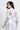Vestido Esmeralda estampado con mangas vaporosas y cinturón decorativo