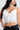 Blusa Brianna en encaje floral con lazo posterior